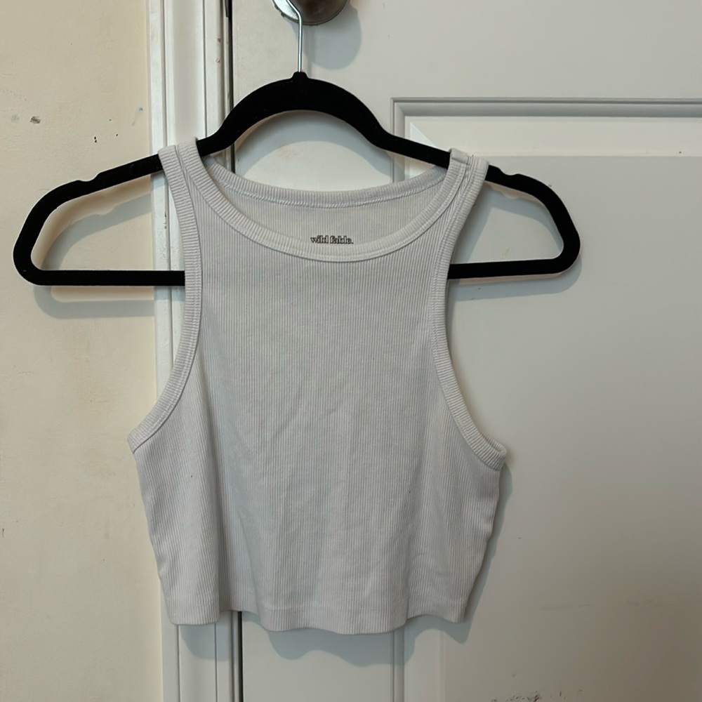 trendy white cropped tank perfect for any occasion!